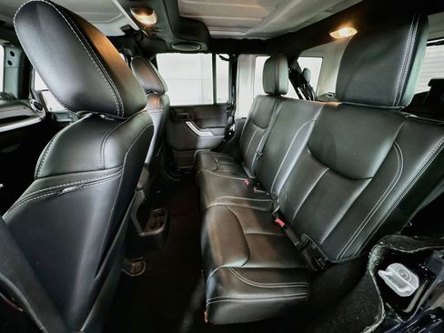 Used 2013 Jeep Wrangler Unlimited Sahara w/ Dual Top Group AWD/4WD image 23