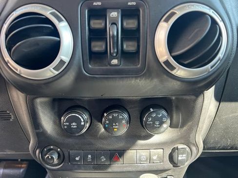 Used 2014 Jeep Wrangler Unlimited Sahara w/ Dual Top Group AWD/4WD image 24