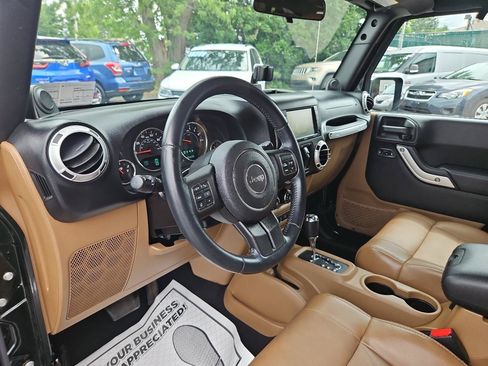 Used 2012 Jeep Wrangler Unlimited Sahara w/ Dual Top Group AWD/4WD image 14