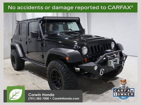 Used 2013 Jeep Wrangler Unlimited Sahara image 1