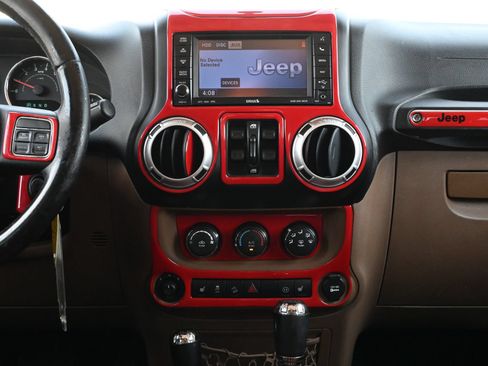 Used 2012 Jeep Wrangler Unlimited Sahara w/ Dual Top Group AWD/4WD image 12