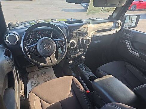Used 2013 Jeep Wrangler Unlimited Sahara w/ Dual Top Group AWD/4WD image 21