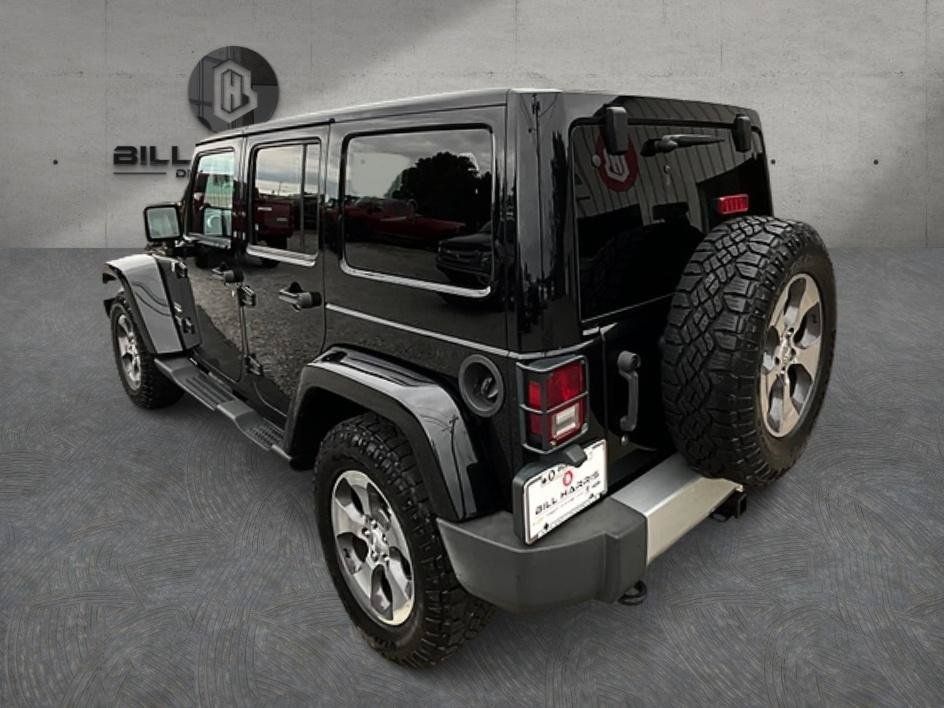 Used 2012 Jeep Wrangler Unlimited Sahara w/ Dual Top Group AWD/4WD image 9