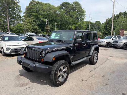 Used 2012 Jeep Wrangler Unlimited Rubicon w/ Dual Top Group