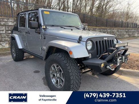 Used 2014 Jeep Wrangler Unlimited Sahara w/ Max Tow Package image 1
