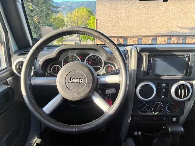Used 2010 Jeep Wrangler Unlimited Sahara w/ Dual Top Group AWD/4WD image 13
