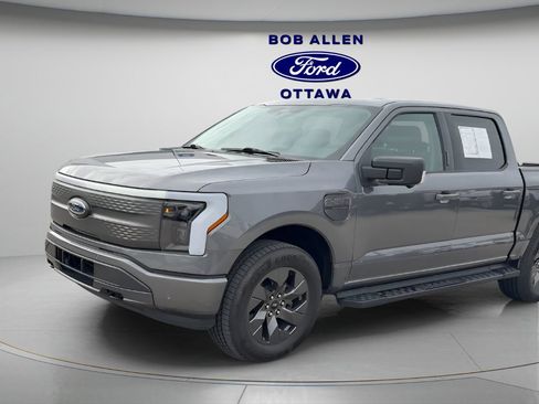 Used 2023 Ford F150 Lightning XLT w/ Equipment Group 312A High image 1