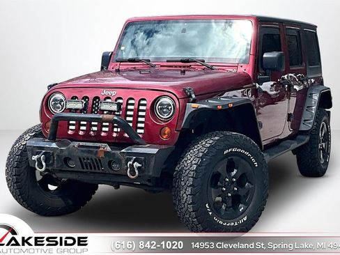 Used 2012 Jeep Wrangler Unlimited Sahara AWD/4WD image 1