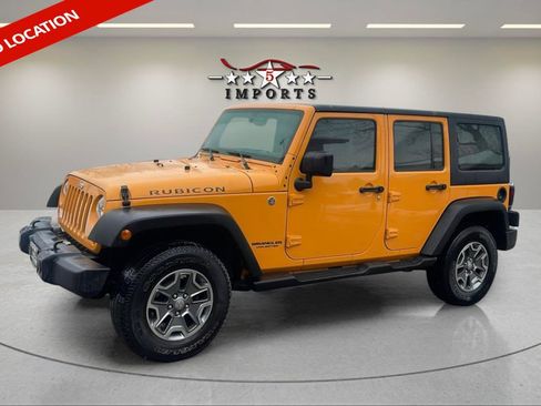 Used 2013 Jeep Wrangler Unlimited Rubicon w/ Dual Top Group image 1