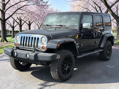 Used 2011 Jeep Wrangler Unlimited Sahara w/ Mopar Chrome Edition Group AWD/4WD image 3