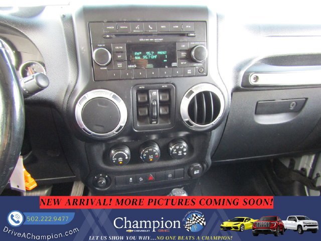 Used 2012 Jeep Wrangler Unlimited Sahara w/ Dual Top Group AWD/4WD image 12