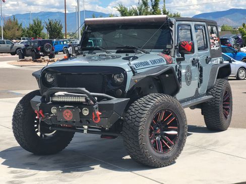 Used 2015 Jeep Wrangler Unlimited Sport AWD/4WD image 1