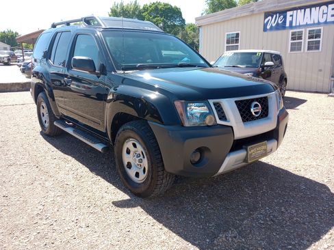 Used 2011 Nissan Xterra X RWD image 1