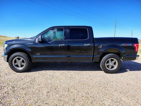 Used 2015 Ford F150 XLT AWD/4WD image 2
