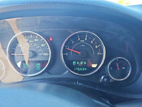 Used 2013 Jeep Wrangler Unlimited Sahara w/ Dual Top Group AWD/4WD image 19