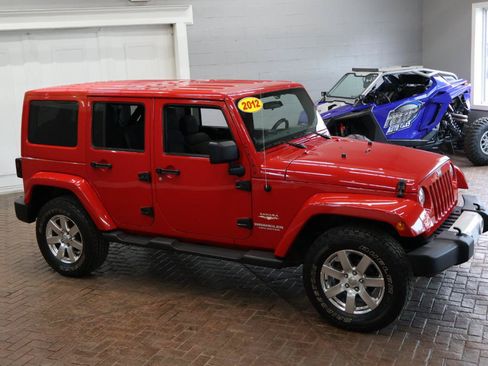 Used 2012 Jeep Wrangler Unlimited Sahara w/ Dual Top Group AWD/4WD image 21
