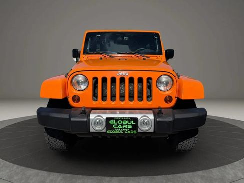 Used 2013 Jeep Wrangler Unlimited Sahara w/ Dual Top Group AWD/4WD image 2