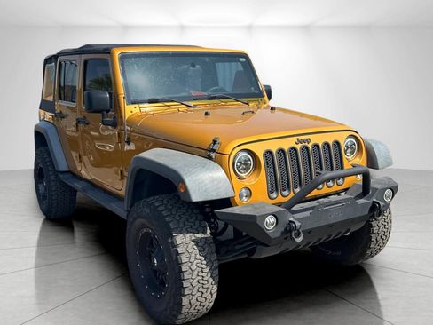 Used 2014 Jeep Wrangler Unlimited Sport image 1