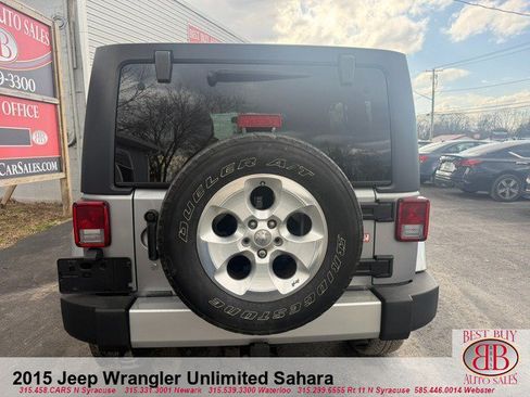 Used 2015 Jeep Wrangler Unlimited Sahara w/ Dual Top Group AWD/4WD image 6