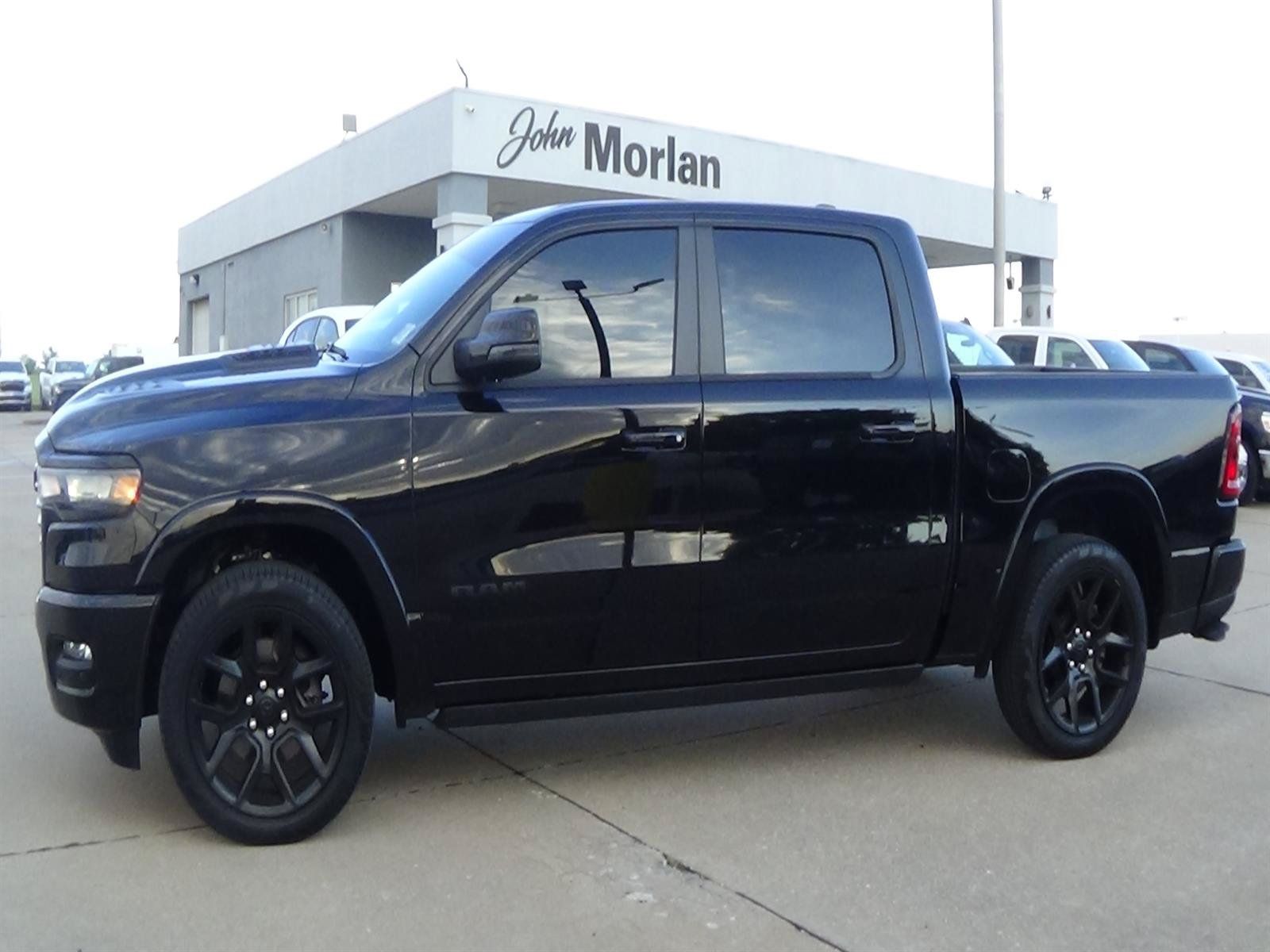 Used 2025 RAM 1500 Laramie w/ Night Edition AWD/4WD image 1