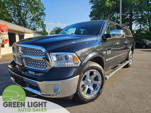 Used 2016 RAM 1500 Laramie w/ Convenience Group AWD/4WD image 1