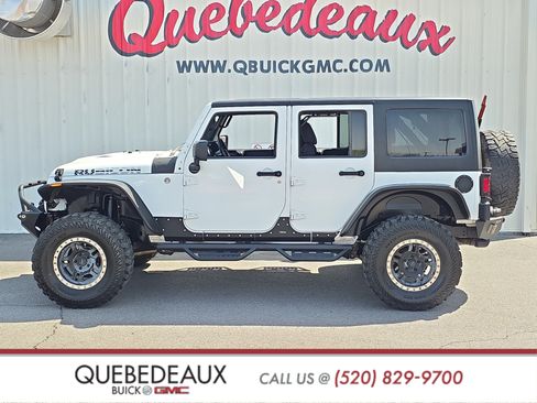 Used 2015 Jeep Wrangler Unlimited Rubicon w/ Dual Top Group AWD/4WD image 4
