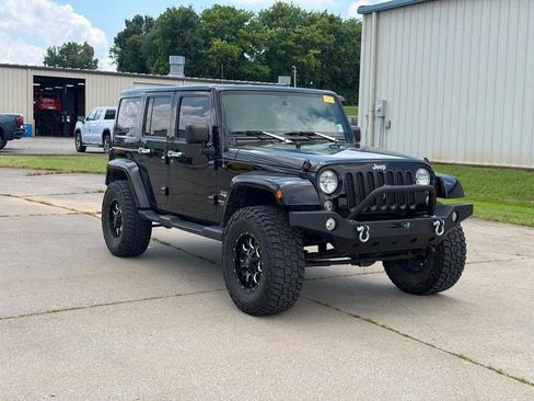 Used 2015 Jeep Wrangler Unlimited Sahara AWD/4WD image 1