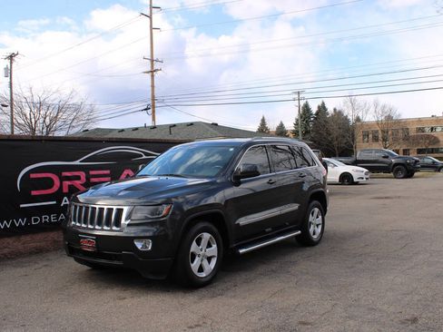 Used 2011 Jeep Grand Cherokee Laredo AWD/4WD image 1