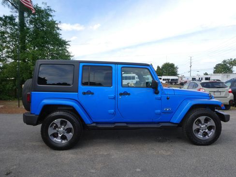 Used 2016 Jeep Wrangler Unlimited Sahara w/ Dual Top Group AWD/4WD image 4