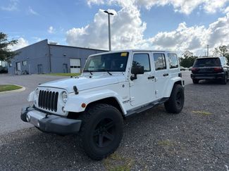 Used 2015 Jeep Wrangler Unlimited Sahara w/ Dual Top Group AWD/4WD video 1