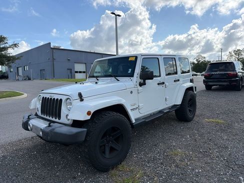Used 2015 Jeep Wrangler Unlimited Sahara w/ Dual Top Group AWD/4WD image 1