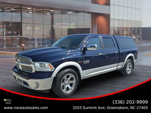 Used 2014 RAM 1500 Laramie AWD/4WD image 1