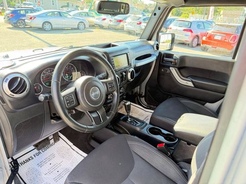 Used 2015 Jeep Wrangler Unlimited Sahara w/ Dual Top Group AWD/4WD image 11