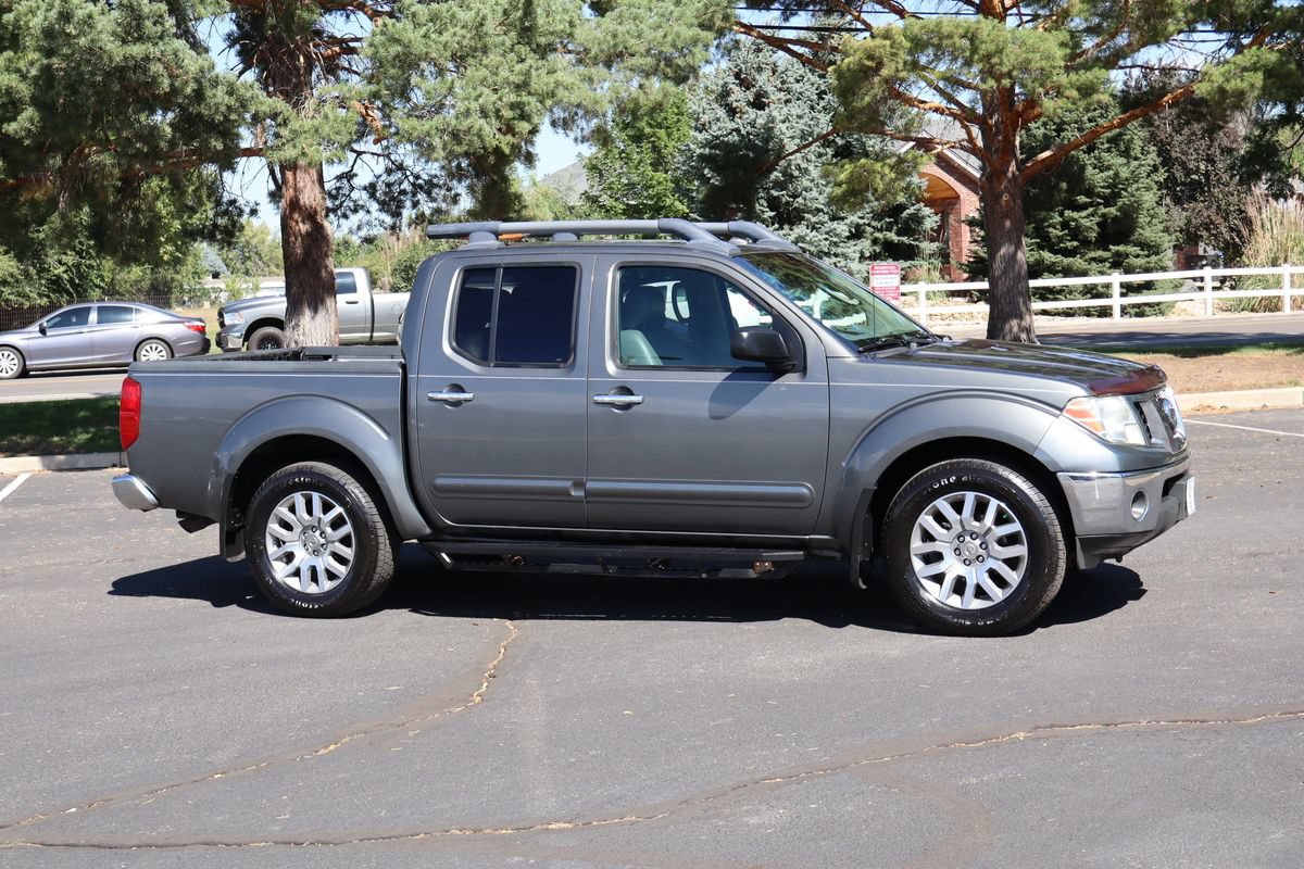 Used 2009 Nissan Frontier LE w/ LE Value Truck Pkg AWD/4WD image 2