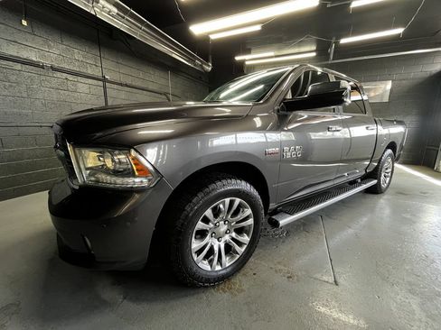 Used 2014 RAM 1500 Limited AWD/4WD image 1