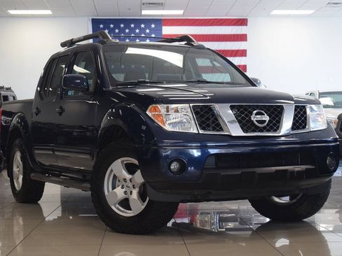 Used 2007 Nissan Frontier LE AWD/4WD image 1