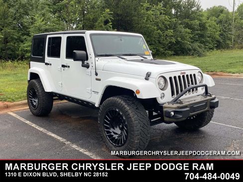 Used 2017 Jeep Wrangler Unlimited Sahara AWD/4WD image 1