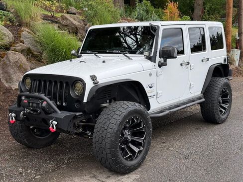 Used 2015 Jeep Wrangler Unlimited Sahara w/ Connectivity Group AWD/4WD image 1