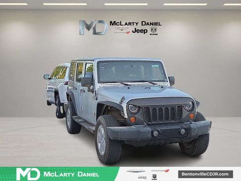 Used 2010 Jeep Wrangler Unlimited Sahara w/ Dual Top Group AWD/4WD image 1