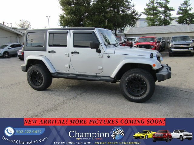 Used 2012 Jeep Wrangler Unlimited Sahara w/ Dual Top Group AWD/4WD image 3