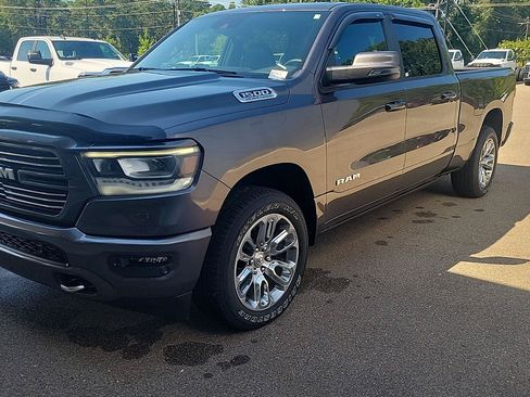 Used 2023 RAM 1500 Laramie AWD/4WD image 1