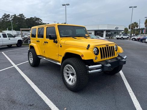 Used 2015 Jeep Wrangler Unlimited Sahara AWD/4WD image 1