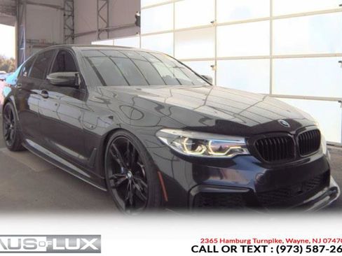 Used 2020 BMW M550i xDrive image 1