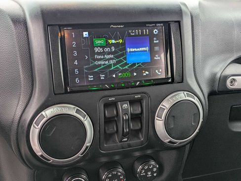 Used 2014 Jeep Wrangler Unlimited Sahara w/ Max Tow Package image 24