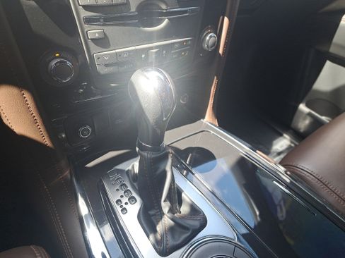 Certified 2019 Nissan Armada Platinum w/ Captain's Chairs Package image 28