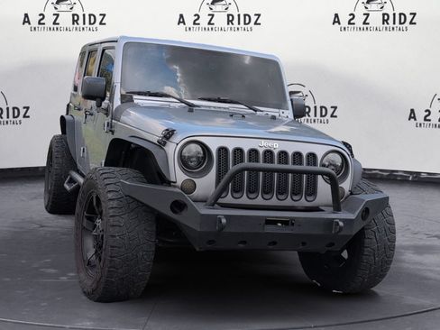 Used 2015 Jeep Wrangler Unlimited Sahara w/ Connectivity Group AWD/4WD image 1