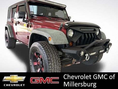 Used 2012 Jeep Wrangler Unlimited Sport AWD/4WD image 1