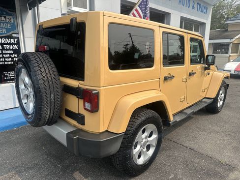 Used 2013 Jeep Wrangler Unlimited Sahara w/ Dual Top Group AWD/4WD image 6