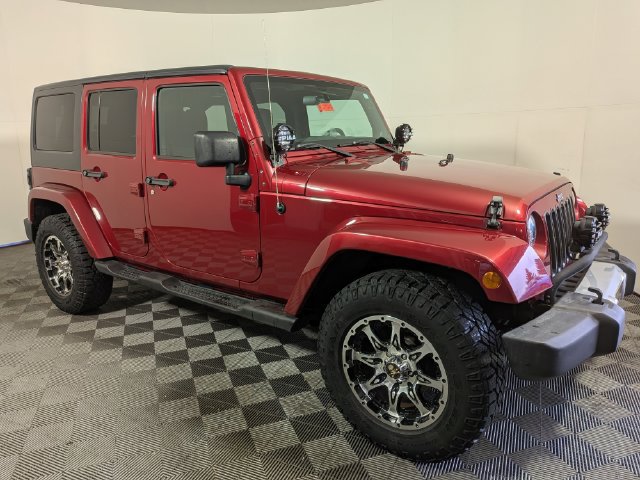 Used 2011 Jeep Wrangler Unlimited Sahara AWD/4WD image 1