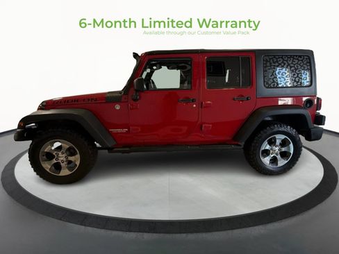 Used 2012 Jeep Wrangler Unlimited Rubicon w/ Dual Top Group AWD/4WD image 4